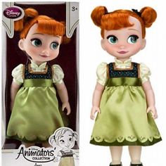 the doll has red hair and green dress