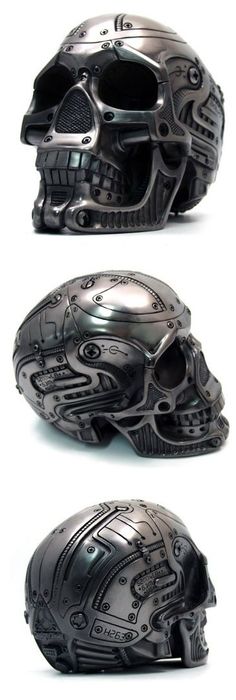 three different views of a skull - like object, one in black and the other in silver