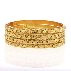 Description: Elevate your jewelry collection with this stunning 21K yellow gold bangle. Perfect for any occasion, this bangle boasts a gorgeous, rich color that is sure to make a statement. The bangle is made with the highest quality gold and is crafted to last a lifetime. Specifications: Metal: 21K Yellow Gold Weight: 30g Item Code: 889623 Luxury Yellow Gold Collectible Bangle, Luxury Yellow Gold Ornate Bangle, Yellow Gold Tarnish-resistant Bangle Bracelet, Yellow 22k Gold Bangle With Intricate Design, Gold-plated Yellow Bangle With Intricate Design, Yellow Gold Bangle, Gold Bangles, Rich Color, Cuff Bracelets