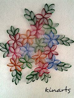 a bunch of colorful flowers with the word kinarts written below them on a white surface