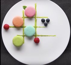 a white plate topped with different types of desserts