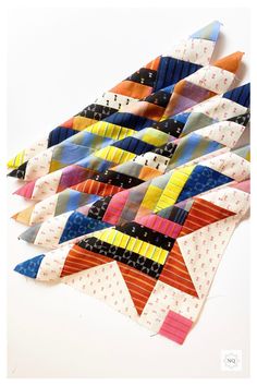 several pieces of colorful fabric are arranged together