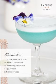 an image of a blue drink with flowers in the middle and text describing it's ingredients