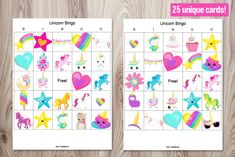 the unicorn bingo game is shown on a wooden table with pink and blue stars, hearts,