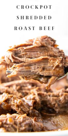 crockpot shredded roast beef on a spoon