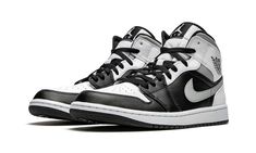 The Air Jordan 1 Mid “White Shadow” highlights the wearability of Michael Jordan’s first signature shoe in its mid-top design by making use of a clean, neutral based color scheme.  The upper of this "White Shadow" colorway is complete with white leather on the perforated toe, upper eyelets, collar overlay, and heel.  A variety of smooth black leather is located on the forefoot overlay and mid-panel.  Light Smoke Grey Swoosh branding appears on the sides and a black leather “Wings” logo resides on the collar.  A white Jumpman emblem can be found on the black nylon tongue tag stitched onto the white nylon tongue.  The "White Shadow" nickname is in reference to this colorway appearing similar to the original black and grey "Shadow" colorway from 1985, just with added white panels.  Release da Air Jordan 1 Mid White Shadow, Jordan 1 Shadow, Air Jordan 1 Mid White, Jordan 1 Mid White, Original Air Jordans, Nike X Travis Scott, White Shadow, Nike Air Jordan 1 Mid, Jordan Sneakers