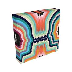 a box with an abstract design on the front and sides, in multicolored colors