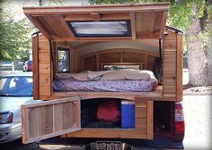 a bed in the back of a pickup truck