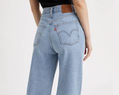 As if our Ribcage jeans couldn't get any better;meet our Ribcage Wide-Leg jeans. The tailored, leggy look of the '70s and a '90s-inspired super high rise come together to create the perfect proportion to show off the rise and define your waistline. With a soaring 12-inch rise, they're about to become your waist-defining, leg-lengthening obsession. Our Ribcage jeans you know and love, now with a wide-leg cut Made with a super high rise Fitted seat and slim leg from thigh to knee for uncompromisin Levis Ribcage Jeans, Levi's Ribcage, Ribcage Jeans, Levis Ribcage, Denim Shoes, Jeans Bootcut, Tall Women, Rib Cage, Jeans Boyfriend