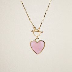 C R Y S T A L ∙ H E A R T ∙ N E C K L A C E A classic heart shaped rose quartz pendant on a gold plated brass toggle chain. Rose quartz is known for it's healing properties: Love, Self-Acceptance, and Emotional Healing. * Design: Crystal Heart Pendant - Toggle Chain Necklace * Material & Finish: Gold Plated Brass * Pendant: Rose Quartz Heart Pendant - Gold Plated Brass Frame * Pendant Size (Approx.): 20mm | 0.8 in * Necklace Length - 2 Options: 17in, 22in ** Your necklace may vary slightly due to the uniqueness of the stone B I R TH S T O N E ∙ A N D ∙ Z O D I A C * Birthstone: January * Zodiac: Taurus, Varies Rose Quartz embodies love and harmony, making it perfect for romantic jewelry. This gem is believed to draw love and mend emotional wounds, aligning with Taurus' longing for deep con January Zodiac, Healing Design, Heart Shaped Rose, Heart Pendant Necklace Gold, Zodiac Taurus, Romantic Jewelry, Crystal Heart Pendant, Pendant Necklace Gold, Romantic Jewellery