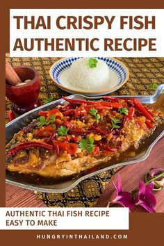 the cover of thai crispy fish authentic recipe, with rice and vegetables on it