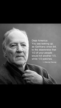 an older man is adjusting his tie in front of a black and white photo with the quote dear america you are waking up as germany