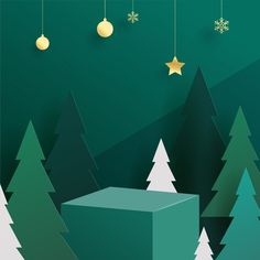 a green christmas card with trees and balls hanging from the tree line, which has snowflakes on them