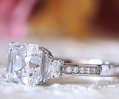 an engagement ring with a large diamond in the center