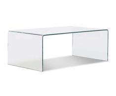 a glass table that is sitting on the ground with no one around it and there is also a white background