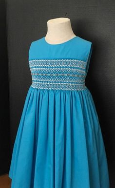 Blue Dress With Smocked Fitted Bodice, Cotton A-line Dress With Smocked Back, Blue Yoke Dress For Spring, Sleeveless Smock Cotton Dress, Fitted Sleeveless Smock Dress, Blue Cotton Smock Dress, English Smocking, Smocked Baby Dresses, Girls Smocked Dresses