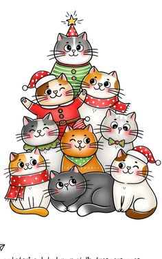 a group of cats sitting next to each other in front of a christmas tree