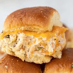 two chicken sliders stacked on top of each other