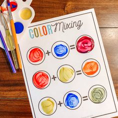 color mixing worksheet with paint and watercolors on the table next to it