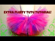 a pink and purple tutu with the words extra fluffy tutu