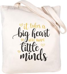 a white bag with the words it takes a big heart to help shape little minds