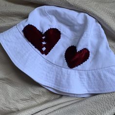 ✨Heartbreak bucket hat✨
✨White heart bucket hat✨
White bucket hat with heart and broken heart 💔❤️ the hearts are velvet material. Hand embroidered 🪡  bucket hat has no flaws but it’s been worn. Dm me if you have any questions. Please read shop policies before purchasing.
Shipping:$3.50
#buckethat #heartbreak #heart #velvet #embroidered Heart Bucket Hat, White Bucket Hat, Embroidered Bucket Hat, Bucket Hat White, Velvet Material, White Heart, Shop Policies, Dm Me, Hats For Women