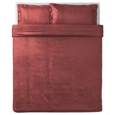 an image of a bed with red sheets and pillowcases on top of it