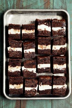 chocolate brownies with marshmallows in a metal pan