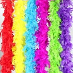 multicolored feather garlands hanging on a wall