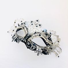 Masquerade mask in silver/black or Gold/Black base studded with rhinestone embellishing. S H I P P I N G - Processed same day or within 24 hours. 1-2 day guaranteed delivery services offered, add items to cart and click on shipping tab for rates. Pls leave a check out note with your need date & contact number (especially for expedited and custom orders) Msg for delivery time frames (Include your state/country). I N C L U D E D Mask comes with matching ribbons S I Z E Adult Size Mask. Detaile Elegant Halloween Masquerade Masks And Prosthetics, Elegant Eye Mask Masquerade For Costumes, Elegant Adjustable Masquerade Mask For Mardi Gras, Silver Rhinestone Eye Mask For Masquerade, Elegant Eye Mask For Masquerade Costume, Carnival Evening Masquerade Eye Mask, Silver Rhinestone Eye Masquerade Mask, Carnival Eye Mask With Rhinestones, Elegant Eye Mask For Masquerade