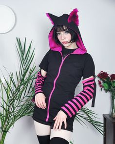 "𝘾𝘼𝙏 𝙀𝘼𝙍𝙎 𝙃𝙊𝙊𝘿𝙄𝙀 - 𝙋𝙄𝙉𝙆 - 𝙈𝘼𝙇𝙀 / 𝙁𝙀𝙈𝘼𝙇𝙀 𝘾𝙐𝙏 Black cat hoodie with ears. This cat ear hoodie has pink fur inside the standing cat ears. 𝗪𝗛𝗔𝗧 𝗪𝗜𝗟𝗟 𝗜 𝗥𝗘𝗖𝗘𝗜𝗩𝗘？ ♥ Zip up hoodie ♥ Hood with cat ears (fur inside) ♥ Detachable sleeves (easy to apply!) ♥ Sleeves with thumbholes ♥ Big pockets to hold your stuff :D 𝗙𝗔𝗕𝗥𝗜𝗖: Cotton sweatshirt, faux fur for the ears 𝗦𝗜𝗭𝗘: Male or female cut. Size chart you will find it on the last photo! For custom size Pink Harajuku Hoodie Outerwear, Pink Harajuku Hoodie, Harajuku Pink Hoodie Outerwear, Pink Punk Outerwear For Streetwear, Halloween Fitted Cotton Hoodie, Fitted Hooded Halloween Hoodie, Punk Style Hooded Hoodie For Cosplay, Pink Harajuku Hoodie With Drawstring, Punk Style Hoodie For Cosplay