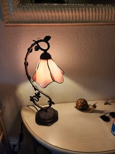 a lamp that is on top of a table