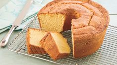 a bundt cake on a cooling rack with slices cut out