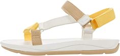 a woman's white and yellow sandal with two straps on the bottom part