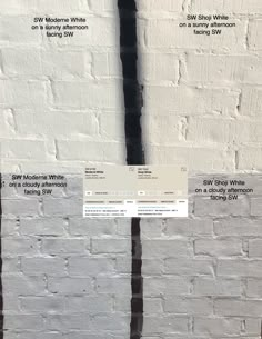 a white brick wall with some black and white lines on the side, along with instructions for how to paint it