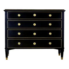 a black and gold chest of drawers with brass knobs on the front, side view