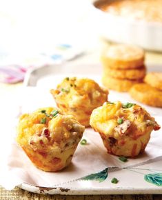 small appetizers are sitting on a white platter and ready to be eaten