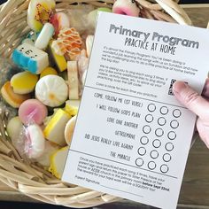 a basket filled with lots of different types of candies and marshmallows