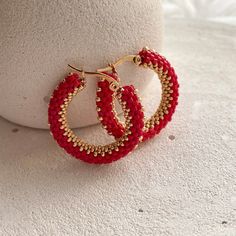 💖 Add a pop of color to your outfit with these red & gold seed bead hoop earrings! These beaded hoop earrings are perfect for adding a touch of fun to any look, whether you're dressing up for Halloween or looking for a unique Christmas gift for your best friend. Stand out from the crowd and show off your unique style with these eye-catching earrings! These handmade hoop earrings are not only stylish but also comfortable to wear all day long * MATERIALS * Hoops are made of high quality Japanese Trendy Handmade Hoop Beaded Earrings, Trendy Colorful Beaded Hoop Earrings For Gifts, Trendy Hoop Beaded Earrings As Gift, Gift Hoop Beaded Earrings, Small Hoop Handmade Earrings As Gift, Trendy Handmade Round Hoop Earrings, Trendy Handmade Hoop Jewelry, Trendy Earrings With Tiny Beads As Gift, Gift Small Hoop Beaded Earrings With Tiny Beads