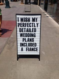 a sign on the sidewalk that says i wish my perfectly detailed wedding plans included a finance