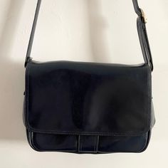 Description: Vintage Navy Blue Jane Shilton Clubhouse Leather Saddle Shoulder Bag . Adjustable Strap. Popper fastening. 5 Compartments Measurements: H: 23cm, W 34cm, Bag to Strap:  51cm Blue Crossbody Satchel For Business, Classic Blue Shoulder Bag, Classic Blue Shoulder Bag For Business, Blue Office Bag With Hasp Closure, Blue Business Satchel, Blue Satchel Bag With Hasp Closure, Retro Blue Bags For Formal Occasions, Classic Blue Crossbody Shoulder Bag, Blue Retro Shoulder Bag With Detachable Strap