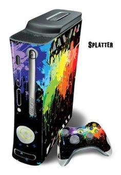 a video game console and controller cover with the word splatter painted on it