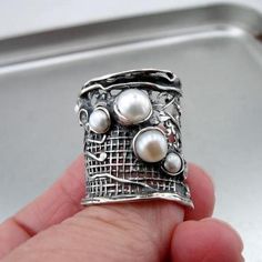 NEW silver gorgeous Ring from Hadar Jewelry Nets collection with five round freshwater Pearls(6mm-3mm) inlaid in 24mm wide sterling silver net. Must see!!!   Available with many other stones. Ask me...   Leabaled ans signed 925. This beauty will sent to you with a modern recycled brown gift box. White Stone Jewelry, Square Diamond Earrings, Pearls Ring, Natural Pearl Ring, Garnet Ring Silver, Silver Pearl Ring, Freshwater Pearl Ring, Natural Gemstone Ring, Wide Ring