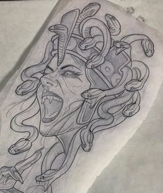 a drawing of a woman's face with snakes on her head