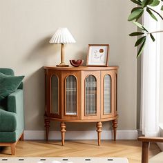 a living room with a couch, chair and side table