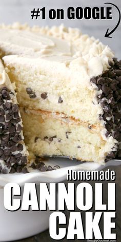 a close up of a cake on a plate with the words homemade cannoli cake