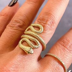 New to the collection! 💚🐍 And be sure to take advantage of the 10% off summer sale- discount automatically applied upon checkout towards any minimum purchase of $150.00 Adjustable Gold Snake Ring, Unique Yellow Gold Snake Ring, Adjustable Gold Bypass Ring Fine Jewelry, Luxury Yellow Gold Snake Shaped Ring, Adjustable Snake Ring In Yellow Gold, Gold 14k Open Snake Ring, Adjustable Yellow Gold Snake-shaped Ring, Gold Snake Ring As Gift, 14k Gold Snake-shaped Ring