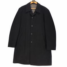 Vintage Hugo Boss virgin wool overcoat in black colour. Single breasted coat. SEE THE PICTURES FOR MORE DETAILS. CONDITION : 9/10 MEASUREMENT Pit : 25 inch Length : 39 inch Shoulder : 20.5 inch Arm Length : 27 inch Size On Tag : 52 Recommended Size : L-XL PAYMENT We accept PayPal only. The item will be ship 3-5 days once the payment has been made. SHIPPING DHL ONLY. USUALLY AROUND 7-21 DAYS BEFORE REACH THE DESTINATION. *NOTES TO BUYERS* PLEASE DO NOT RELY ON THE SIZE OF THE TAG, SOME OF THE SIZ Classic Tailored Outerwear For Cold Weather, Tailored Classic Outerwear For Cold Weather, Classic Black Wool Coat With Concealed Placket, Classic Black Wool Coat For Business, Classic Outerwear With Buttons For Cold Weather, Black Wool Sport Coat With Buttons, Classic Black Winter Sport Coat, Classic Long Wool Coat For Cold Weather, Long Coat For Cold Weather