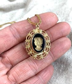 "You will receive this beautiful vintage Elba watch pendant that features a black and gold intaglio on the reverse. The watch pendant measures 1 1/4\" x 1\". Its working condition is unknown. The chain is a vintage Monet, and is signed on the hang tag. It measures 28\" long. This is an estate item and is in very good vintage condition with no metal loss and intact intaglio. We will be listing more treasures from this estate, so check back often. For finished vintage assemblage and vintage inspir Watch Pendant, Silk Necklace, Vintage Assemblage, Vintage Monet, Gorgeous Bracelet, Elba, Pendant Gold, Watch Necklace, Base Metal