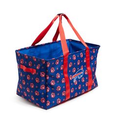 the buffalo bills tote bag is blue with red trim and has flowers on it